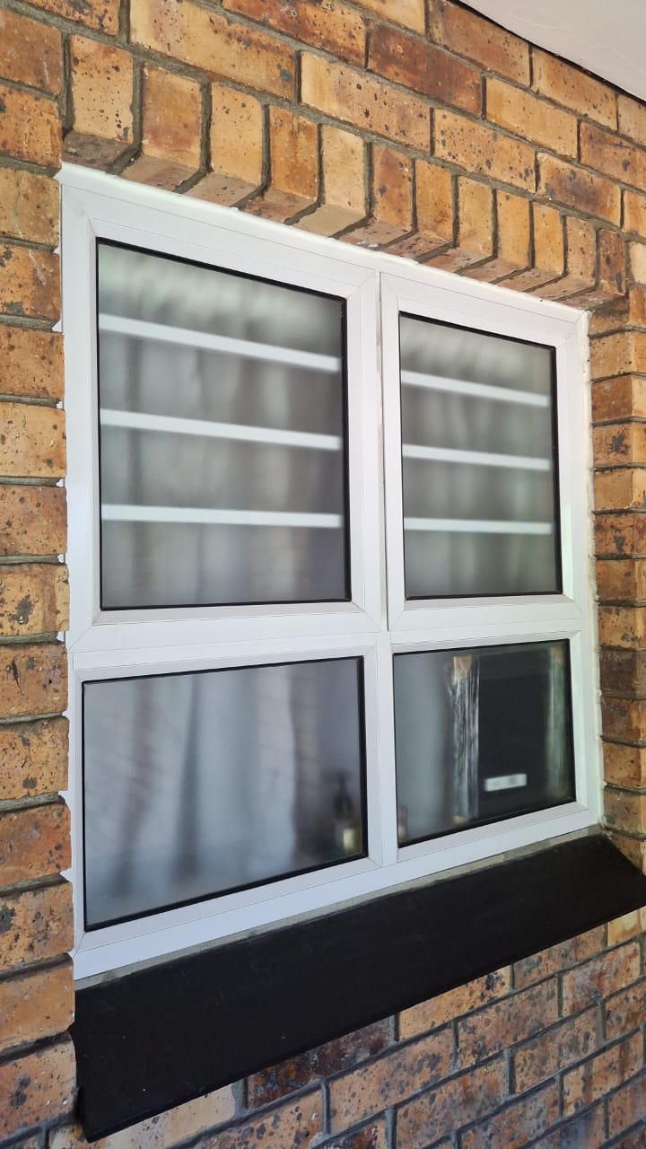 Window – PTT window with obscure glass and aluminium burglar bars